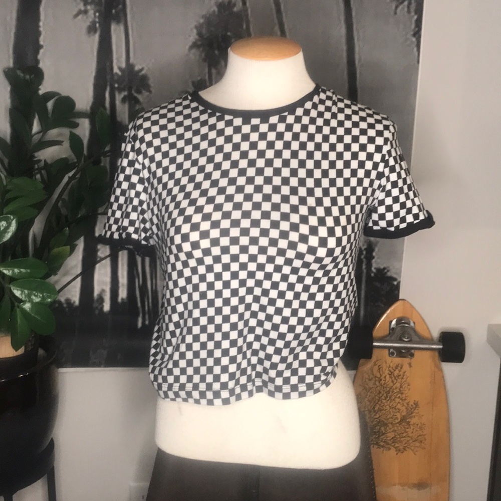 Black and white checkered half shirt.